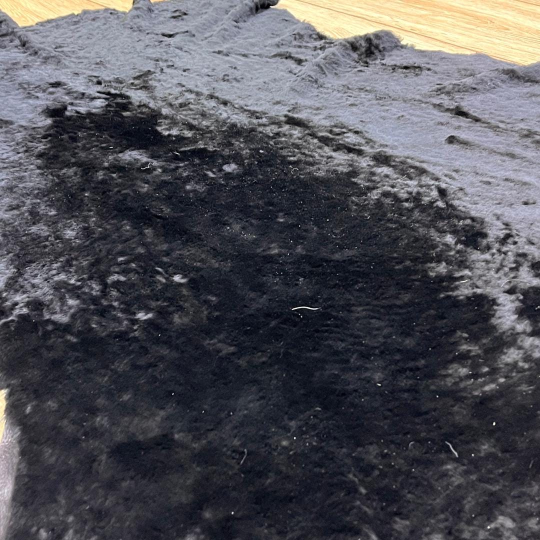 Black Sheepskin Rug: Genuine Australian Sheep Hide, Soft Fur (70x100 cm / 2.3x3.33 Ft - BuzzLeatherCarpetBlack Sheepskin Rug: Genuine Australian Sheep Hide, Soft Fur (70x100 cm / 2.3x3.33 Ft
