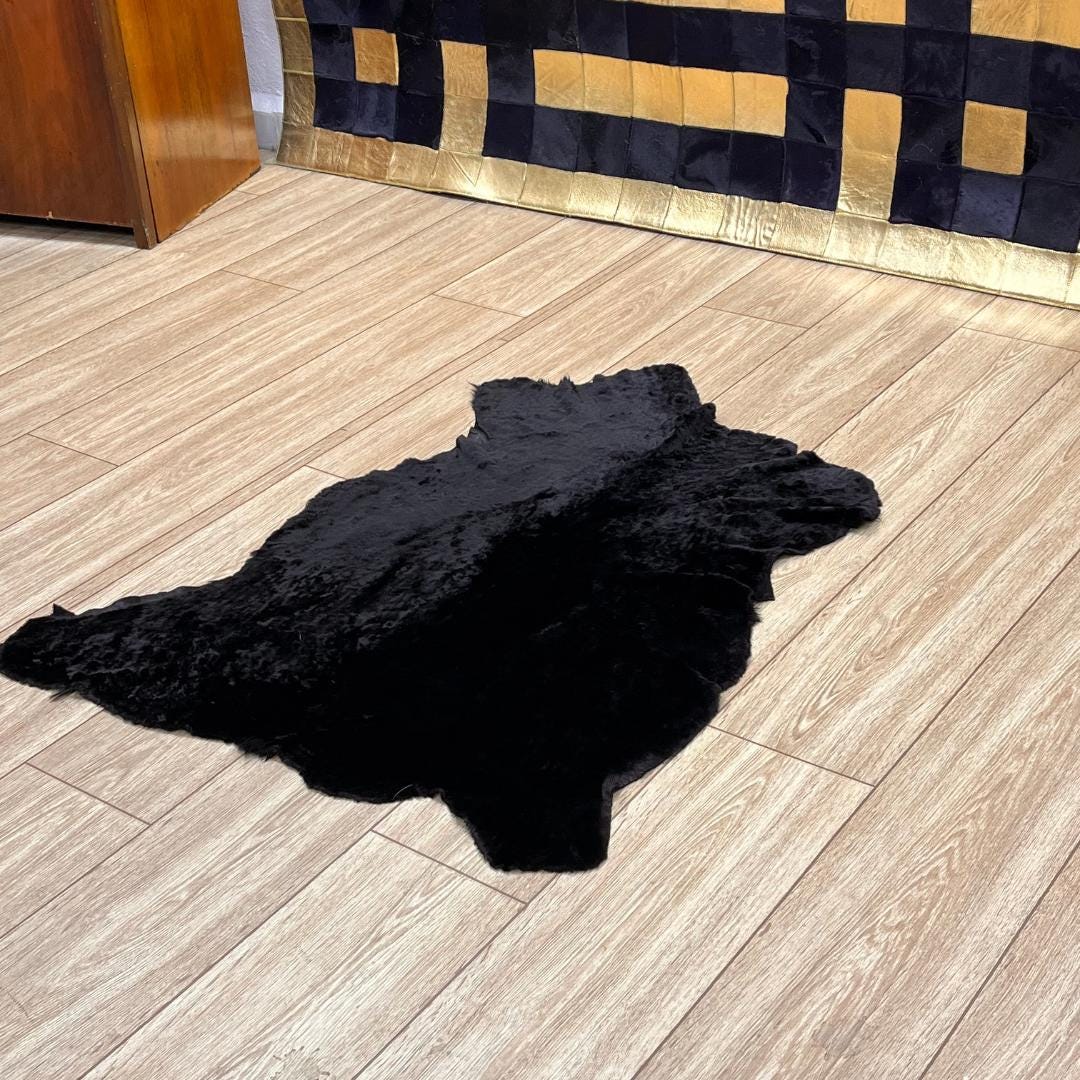 Black Sheepskin Rug: Genuine Australian Sheep Hide, Soft Fur (70x100 cm / 2.3x3.33 Ft - BuzzLeatherCarpetBlack Sheepskin Rug: Genuine Australian Sheep Hide, Soft Fur (70x100 cm / 2.3x3.33 Ft