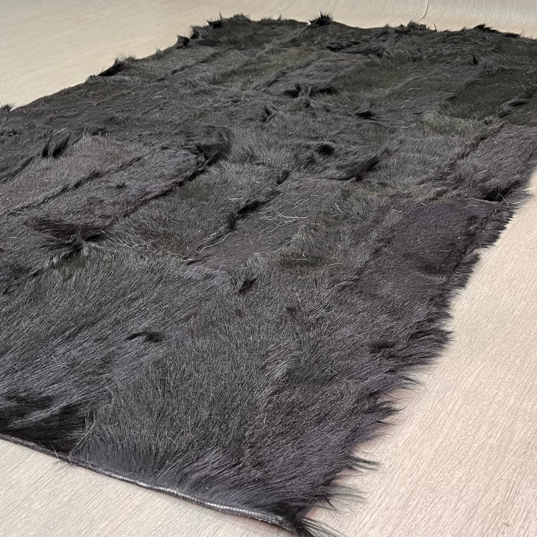 Handmade Black Patchwork Goatskin Rug: Soft, Plush Texture - BuzzLeatherCarpetHandmade Black Patchwork Goatskin Rug: Soft, Plush Texture