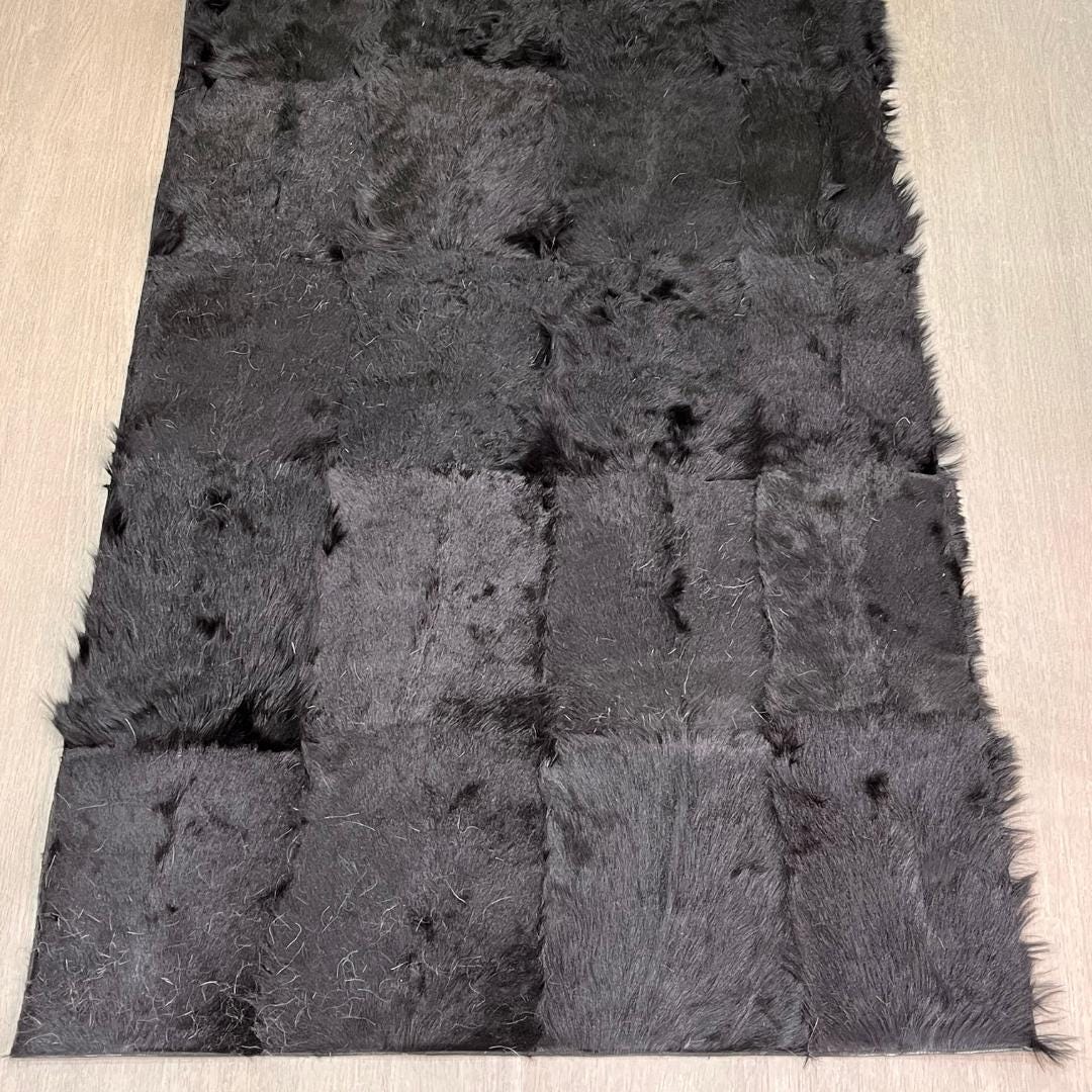 Handmade Black Patchwork Goatskin Rug: Soft, Plush Texture - BuzzLeatherCarpetHandmade Black Patchwork Goatskin Rug: Soft, Plush Texture