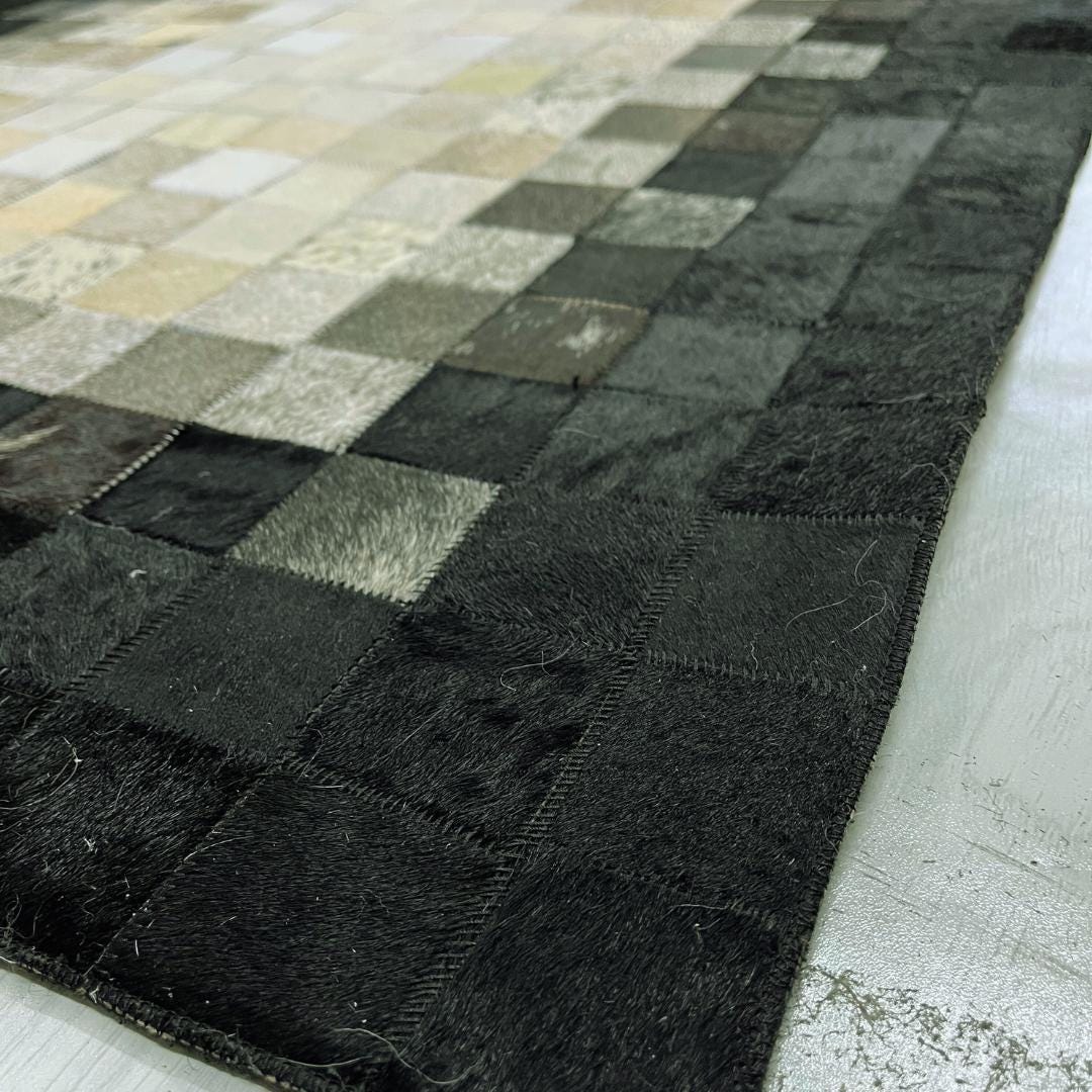 Handmade Black & White Cowhide Runner Rug: Patchwork Area Rug - BuzzLeatherCarpetHandmade Black & White Cowhide Runner Rug: Patchwork Area Rug