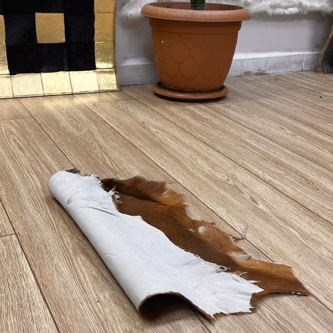 Handmade Brown Goatskin Rug: Scandinavian Home Decor (16x17 in - BuzzLeatherCarpetHandmade Brown Goatskin Rug: Scandinavian Home Decor (16x17 in