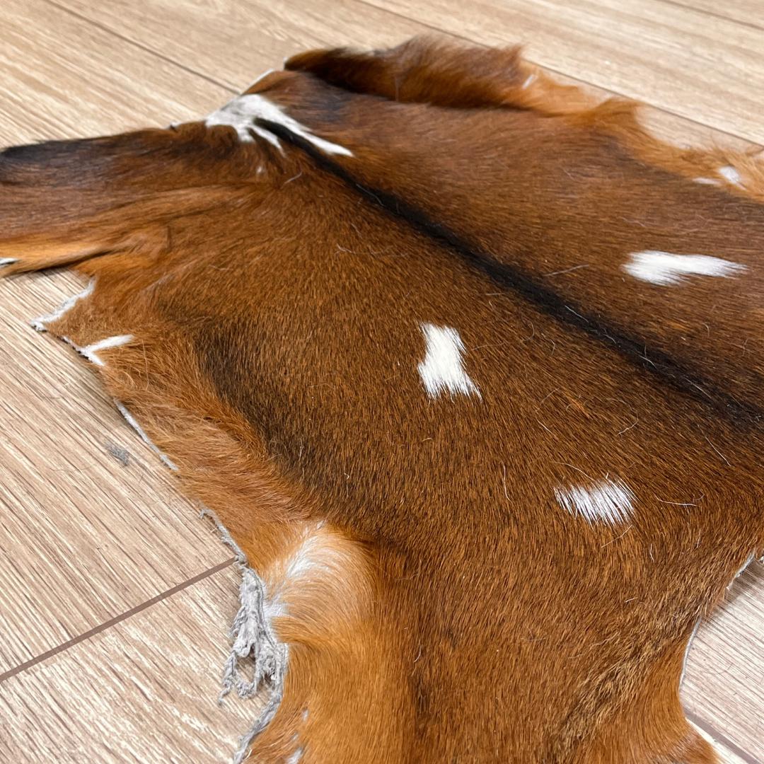 Handmade Brown Goatskin Rug: Scandinavian Home Decor (16x17 in - BuzzLeatherCarpetHandmade Brown Goatskin Rug: Scandinavian Home Decor (16x17 in