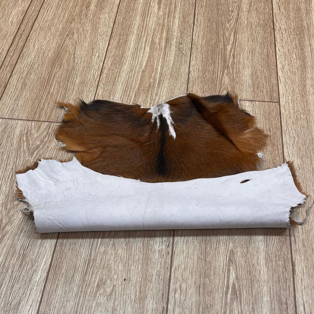 Handmade Brown Goatskin Rug: Scandinavian Home Decor (16x17 in - BuzzLeatherCarpetHandmade Brown Goatskin Rug: Scandinavian Home Decor (16x17 in