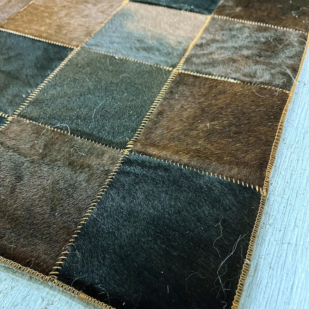 Handmade Brown & White Cowhide Patchwork Rug: Natural Home Decor - BuzzLeatherCarpetHandmade Brown & White Cowhide Patchwork Rug: Natural Home Decor