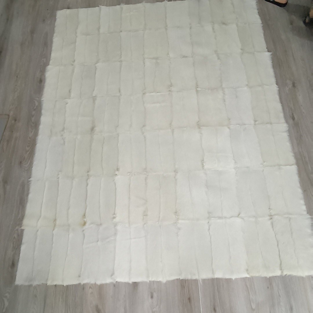 Handmade Patchwork Goatskin Rug: Soft, Plush Texture - BuzzLeatherCarpetHandmade Patchwork Goatskin Rug: Soft, Plush Texture
