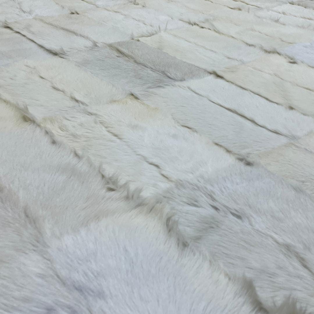 Handmade Patchwork Goatskin Rug: Soft, Plush Texture - BuzzLeatherCarpetHandmade Patchwork Goatskin Rug: Soft, Plush Texture