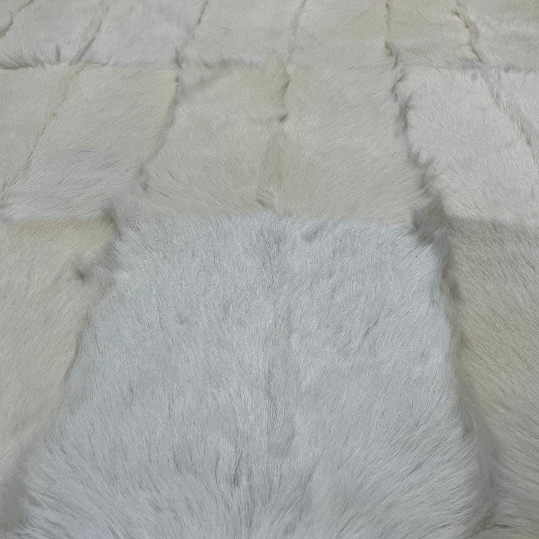 Handmade Patchwork Goatskin Rug: Soft, Plush Texture - BuzzLeatherCarpetHandmade Patchwork Goatskin Rug: Soft, Plush Texture