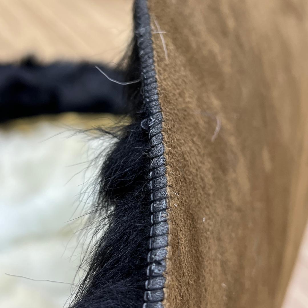 Luxurious Black & White Sheepskin Rug: Handmade Round Area Rug - BuzzLeatherCarpetLuxurious Black & White Sheepskin Rug: Handmade Round Area Rug