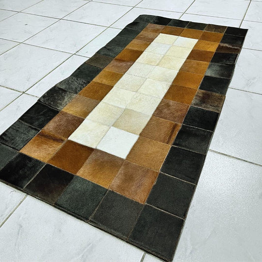 Tricolor Cowhide Patchwork Rug: Handmade Leather Area Rug - BuzzLeatherCarpetTricolor Cowhide Patchwork Rug: Handmade Leather Area Rug