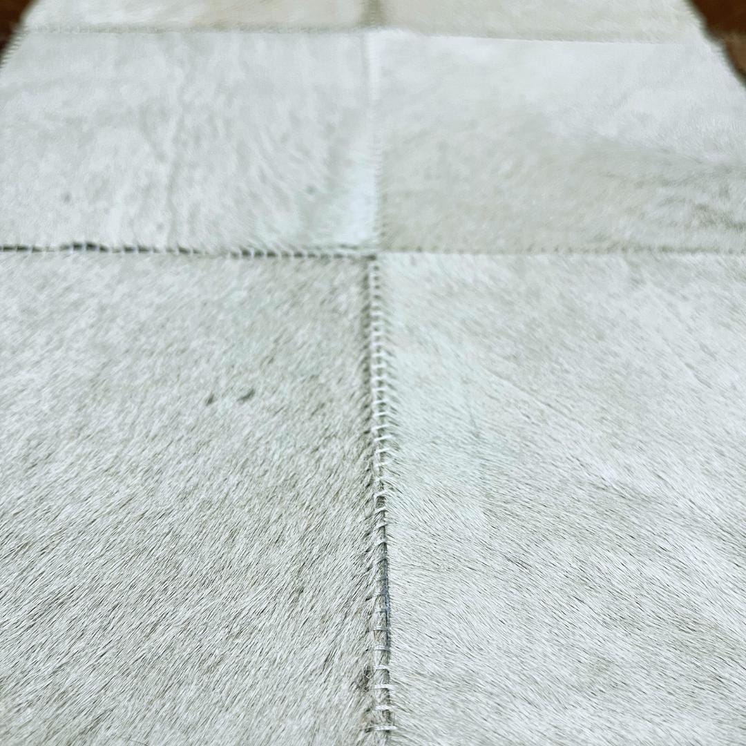 Tricolor Cowhide Patchwork Rug: Handmade Leather Area Rug - BuzzLeatherCarpetTricolor Cowhide Patchwork Rug: Handmade Leather Area Rug