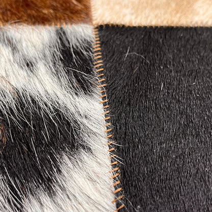 Tricolor Cowhide Patchwork Rug: Rustic Leather Area Rug - BuzzLeatherCarpetTricolor Cowhide Patchwork Rug: Rustic Leather Area Rug
