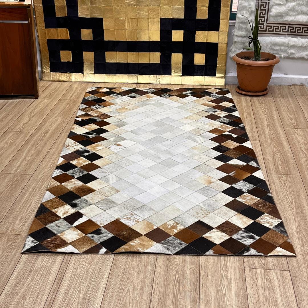 Tricolor Cowhide Patchwork Rug: Rustic Leather Area Rug - BuzzLeatherCarpetTricolor Cowhide Patchwork Rug: Rustic Leather Area Rug